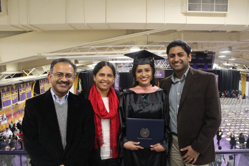 Adithi with family for graduation